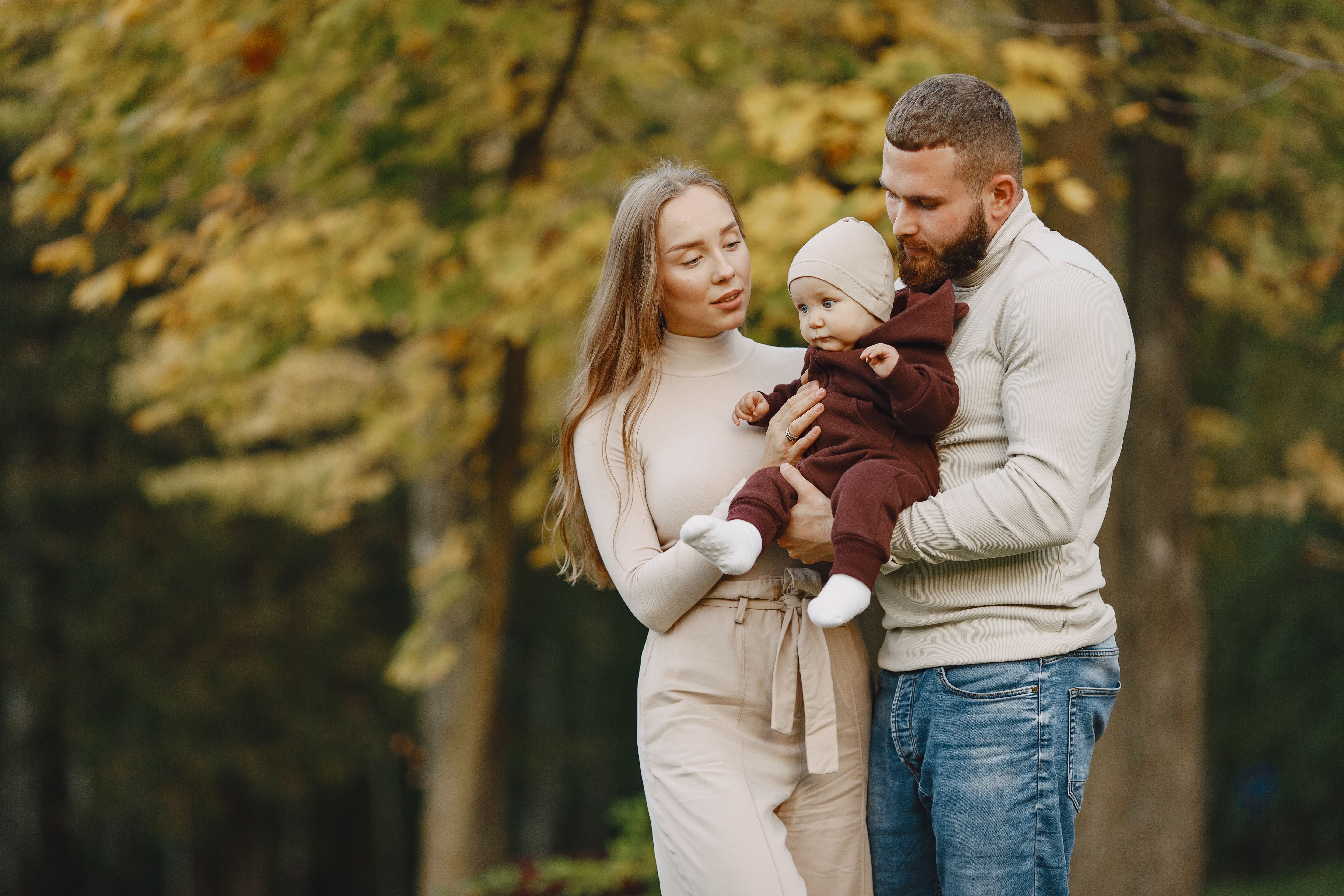 family-autumn-park-man-brown-sweater-cute-little-girl-with-parents (1).jpg